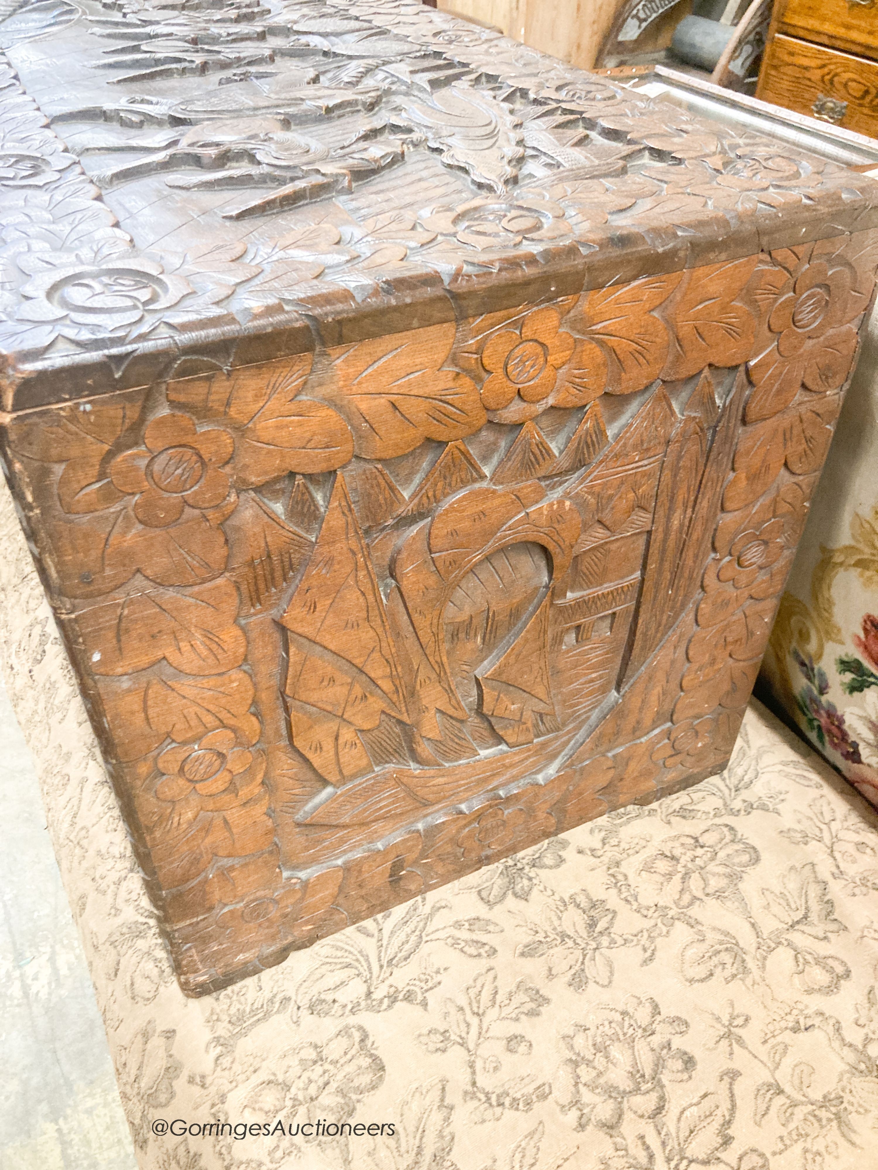 A Cantonese carved hardwood chest, length 104cm, depth 46cm, height 49cm